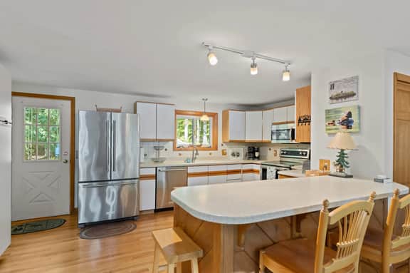 Waterfront 4BR Lake House l Private Dock & Views - Image 3